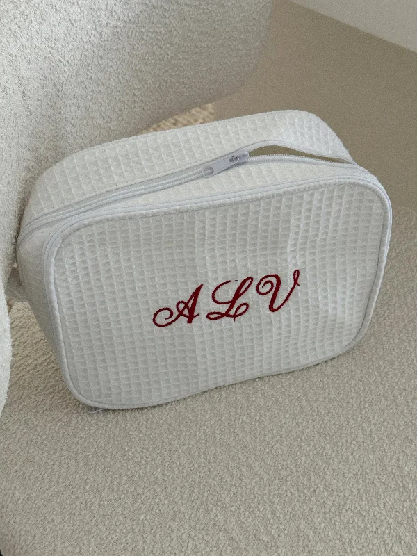 EMBROIDERED TOILETRY POUCH