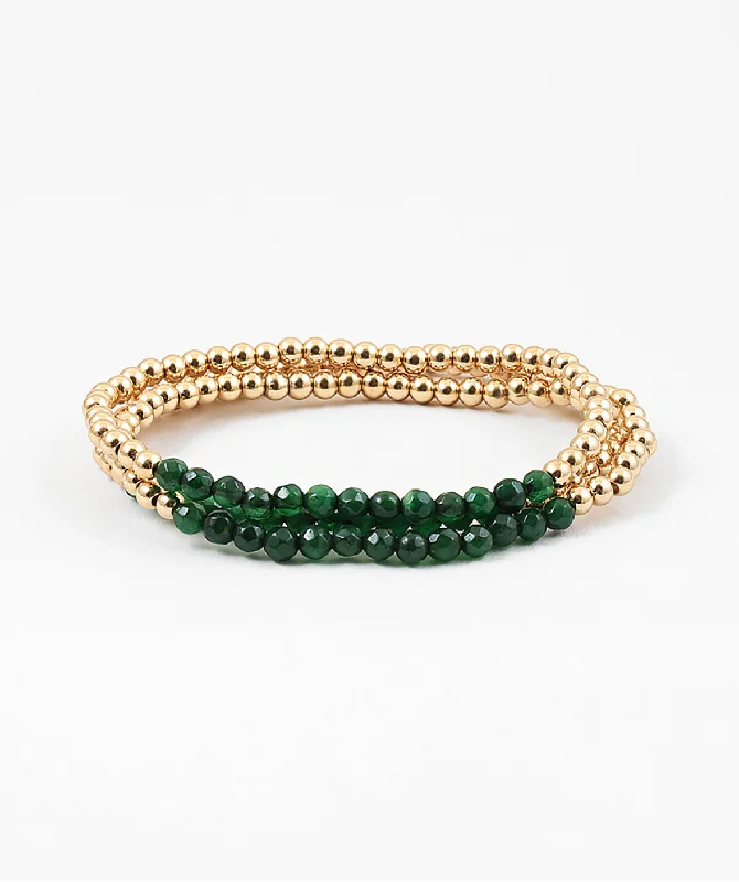 Emerald and Gold Bracelets