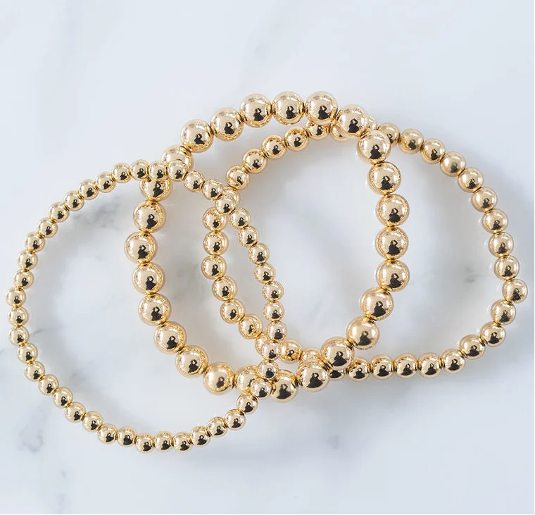 Triple Gold Bracelets